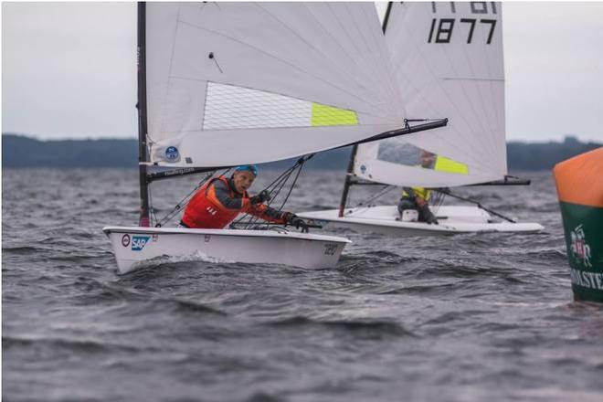 Simonas Jersovas of Lithuania leads Dmitry Tretyakov of Russia into the gybe - RS Aero European Championships © SBG Films